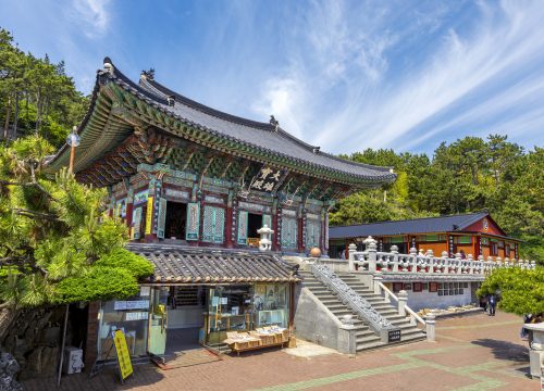 Haedong Yonggungsa Temple in Busan, South Korea.  The Chinese text translates "Grand Hall"