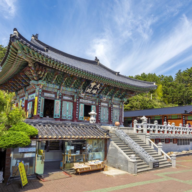 Haedong Yonggungsa Temple in Busan, South Korea.  The Chinese text translates "Grand Hall"